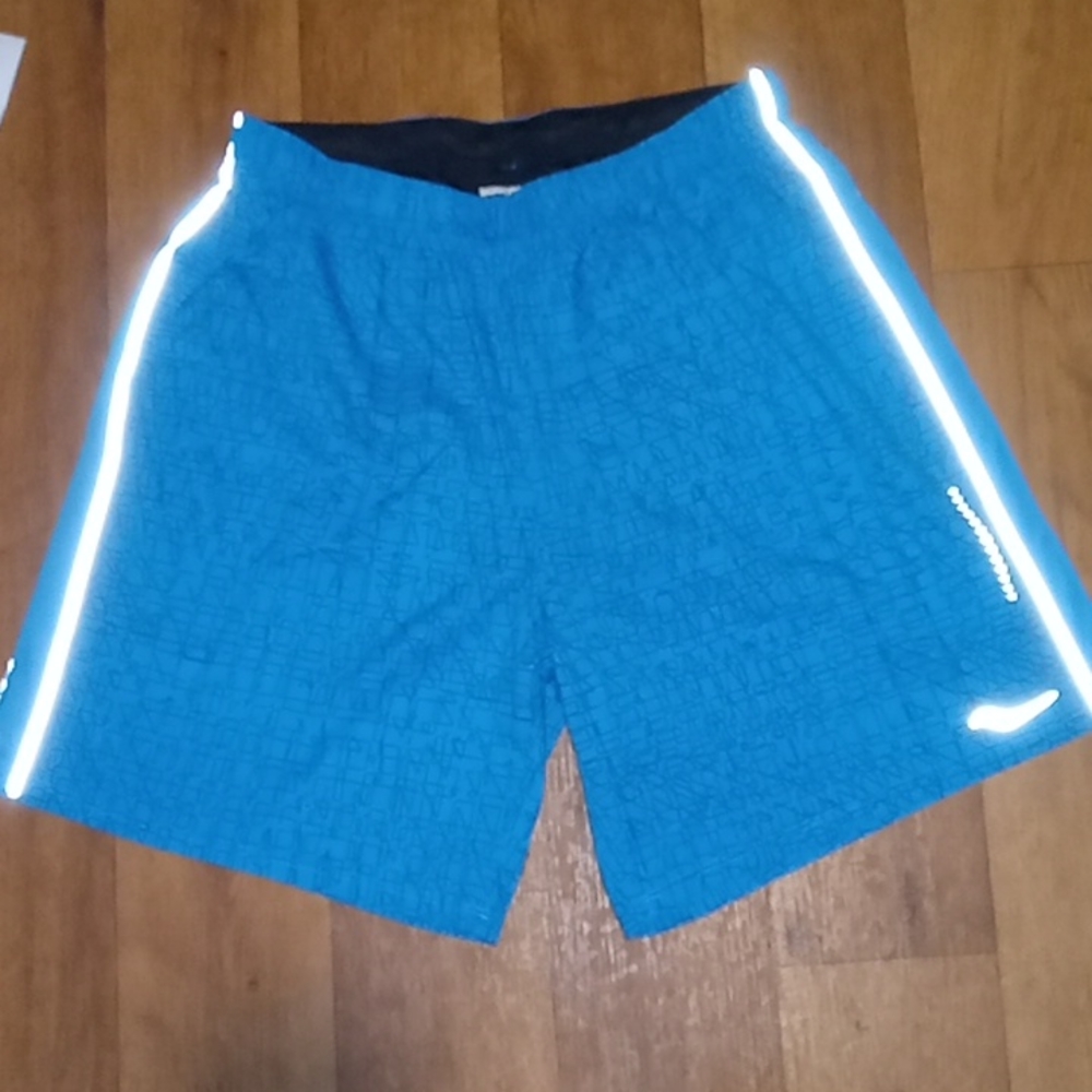 Men's "Saucony" blue active/running shorts w/ Reflective strips